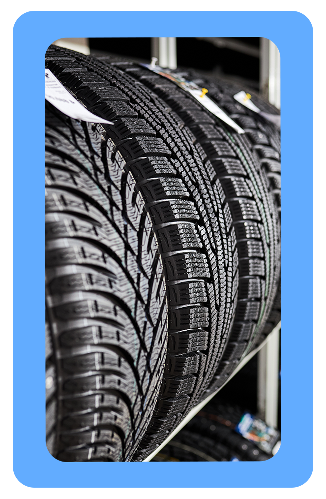 The Cold Facts of Winter Tires | West Broad Hyundai in Henrico, VA | Close up of brand new winter tires sitting on a tire rack