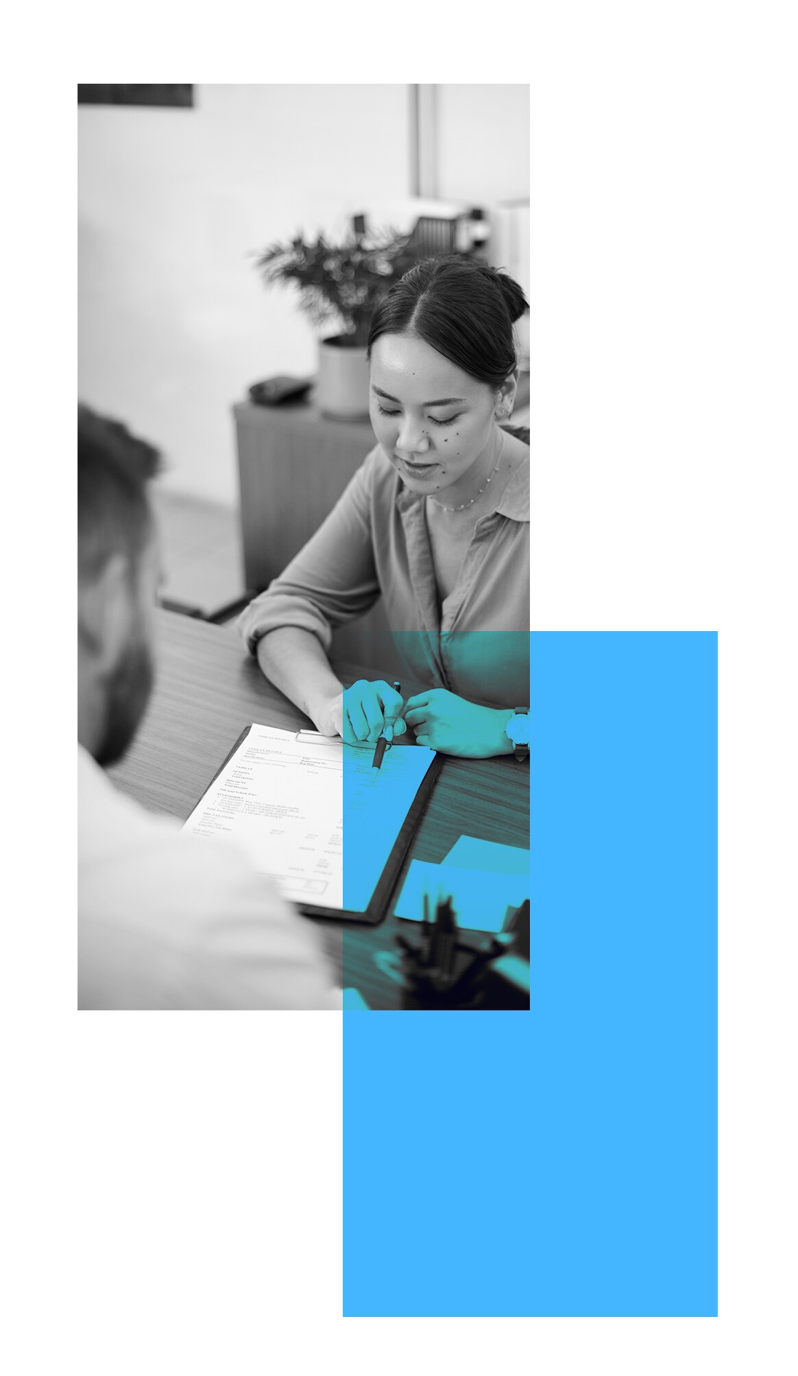 Vehicle Warranty Information at West Broad Hyundai in Henrico, VA | Woman signing paperwork
