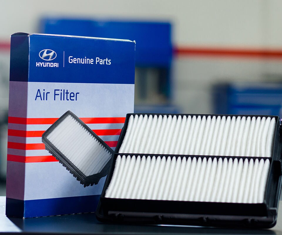 Tips for spring cleaning your car at West Broad Hyundai in Henrico, VA | Genuine Hyundai Air Filter Sitting on Counter in Mechanic Shop