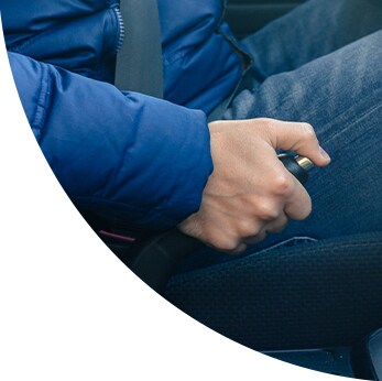 Brake replacement and Safety at West Broad Hyundai | Close-up of parking brake being pulled back