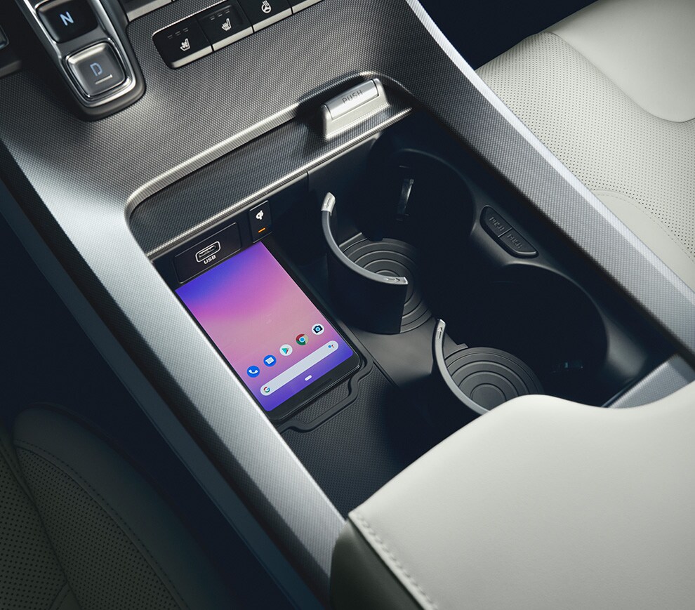 Car Technology Trends at West Broad Hyundai in Henrico, VA | close up of wireless charger in the 2023 Hyundai Palisade