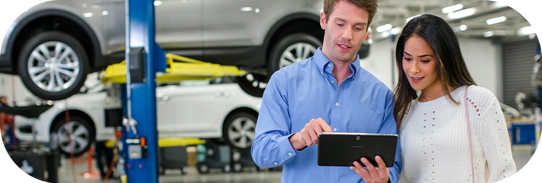 Brake replacement and Safety at West Broad Hyundai | Hyundai salesman helps customer
