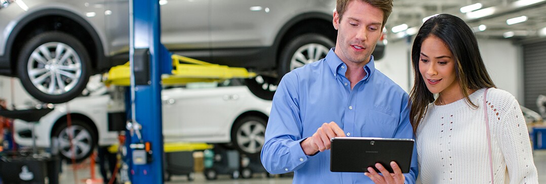 Best Gas Type for My Vehicle at West Broad Hyundai | Service technician shows customer the benefits of using the correct gas