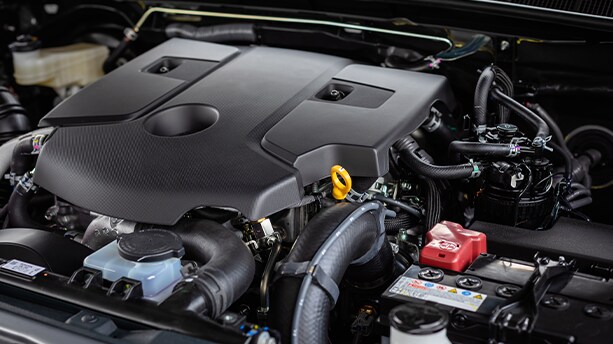 How to prepare your Volkswagen for the winter season in Richmond, VA at West Broad VW | Engine bay showing battery and engine hoses
