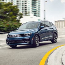 Model Features of the 2021 Volkswagen Tiguan at West Broad VW | Tiguan taking turn fast