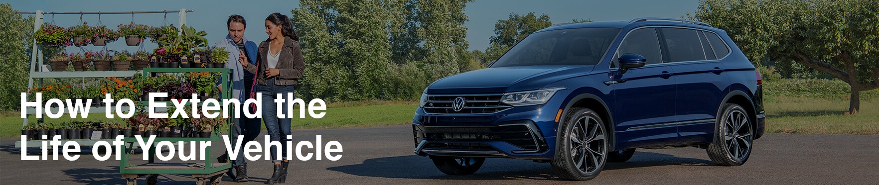 Extend the Life of Your Vehicle at West Broad VW in Richmond, VA | Blue Volkswagen Tiguan with white text on the left side saying 'How to Extend the Life of Your Vehicle'