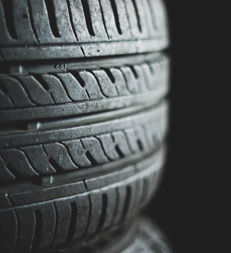 What is a Tire Rotation? at West Broad Volkswagen | An Up Close Photo of a Tire Sitting on its Side