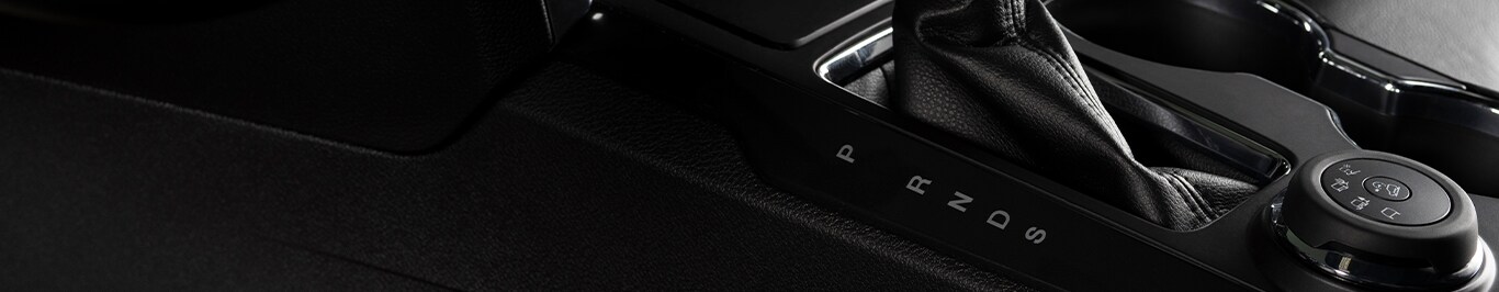 Enjoy A Test Drive At West Broad VW in Richmond, VA | Close up of black interior of a new car showing the center console