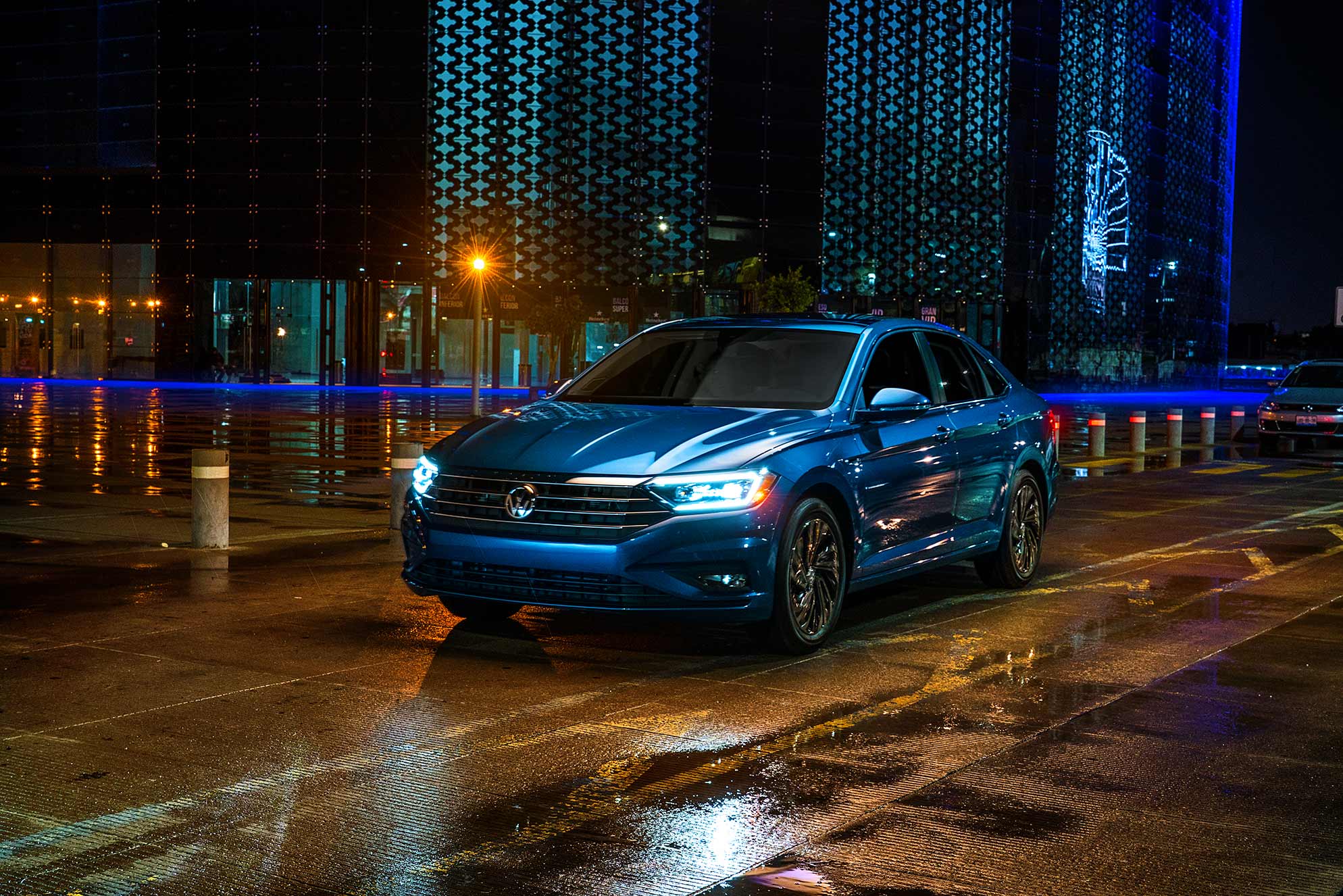 West Broad Volkswagen is a Volkswagen Dealership near Tuckahoe, VA | 2020 Volkswagen Jetta parked on city street at night