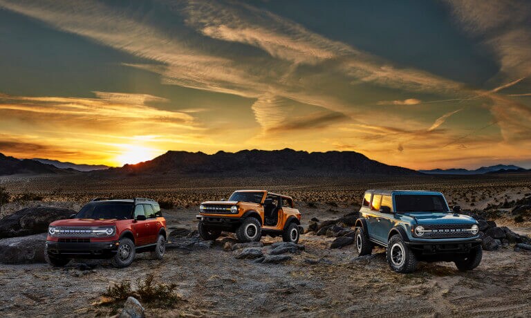 2022 Ford Bronco exterior parked on a desert by a sunset