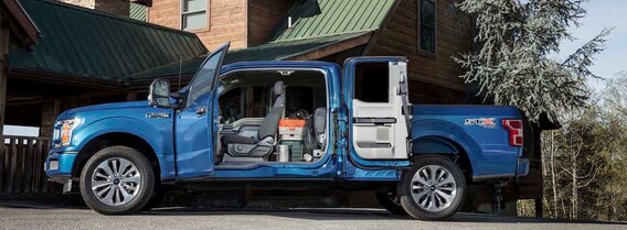 Blue 2019 Ford F-150 Parked With its Doors Open