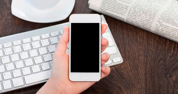 hand holding phone (s).jpg