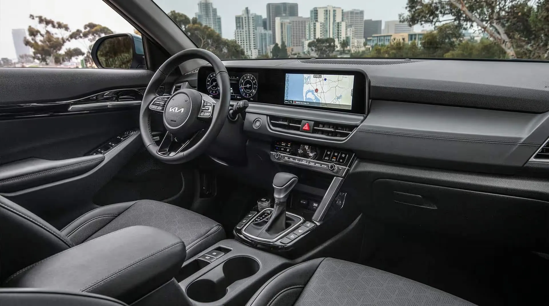 2026 Kia Seltos interior with large touchscreen.
