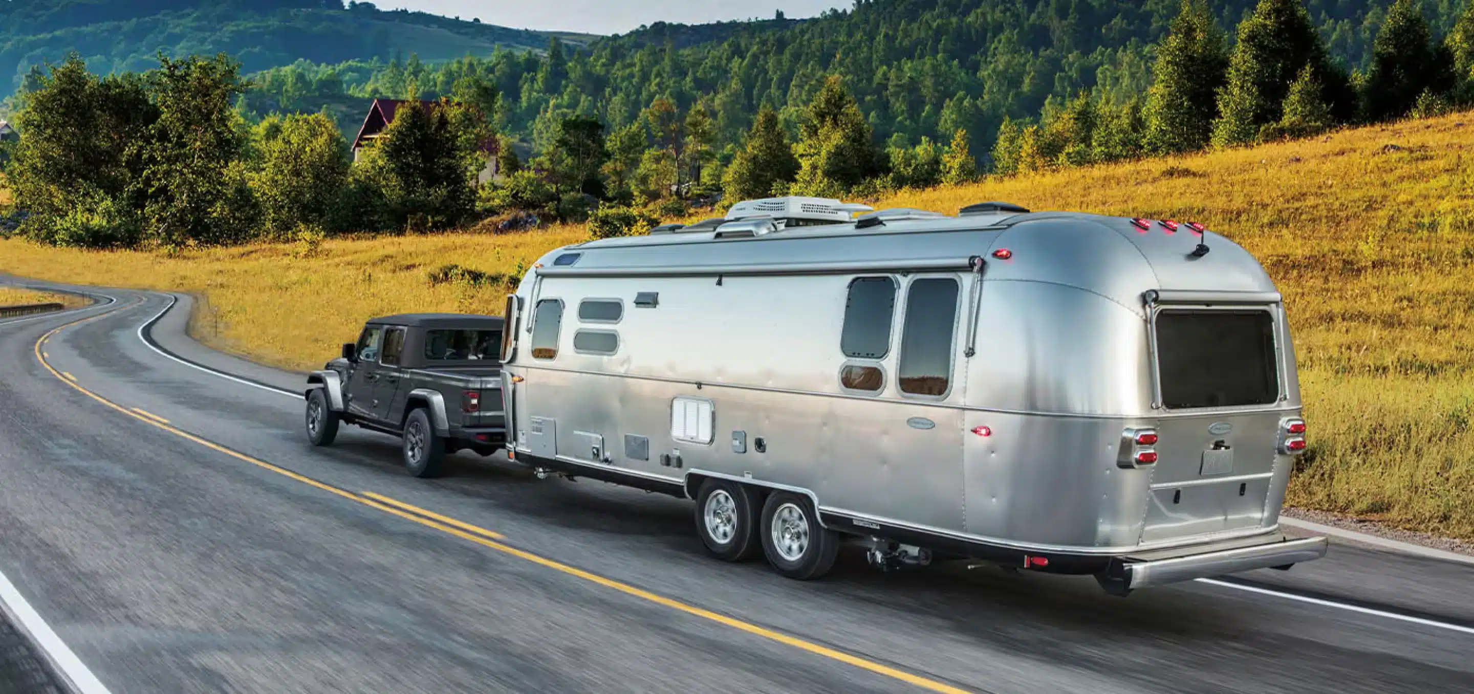 2026 Jeep Gladiator Towing cabin on Highway