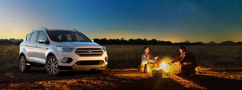 Test Drive a 2018 Ford Escape Today A couple on a camping trip in their 2018 Ford Escape