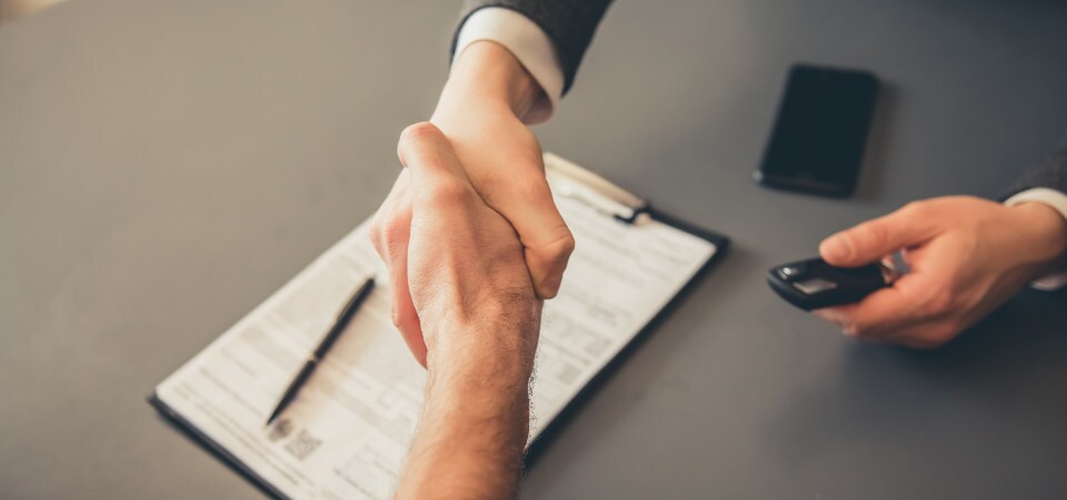 Call Us Today! two people shaking hands
