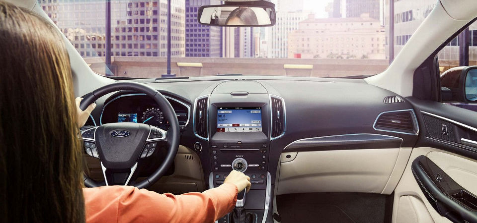 Ford Edge SUV Woman driving a Ford Edge