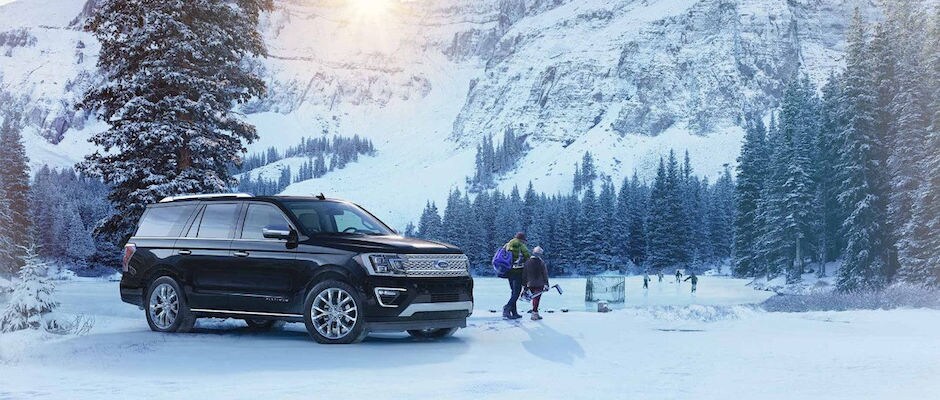 Test Drive a Ford SUV Today A parked Ford SUV at an ice rink.