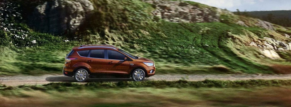 Test Drive a 2018 Ford Escape Today A 2018 Ford Escape driving through the mountains