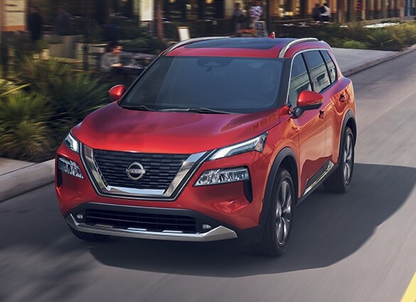 2023-Nissan-Rogue-Driving-ScarletRed.png