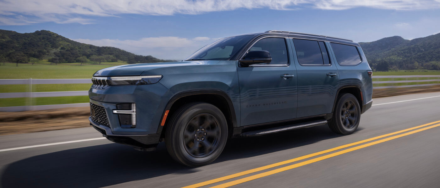 2026 Jeep Grand Wagoneer Exterior Driving On Country Mountain Road
