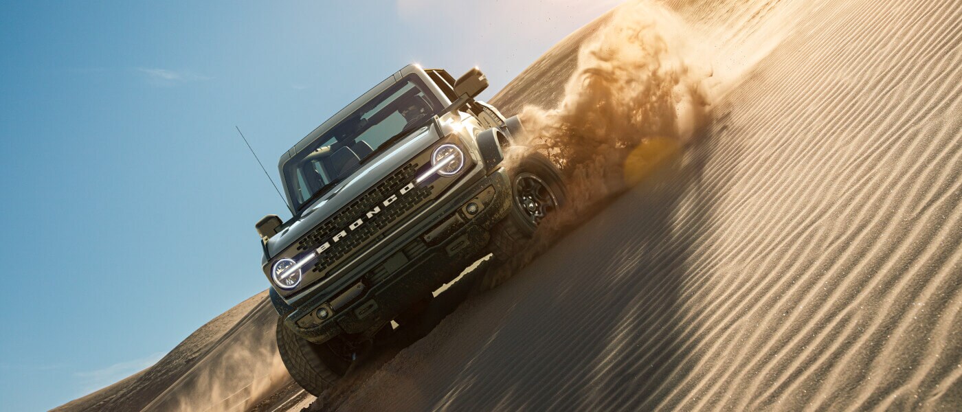 2026 Ford Bronco driving in sand dunes