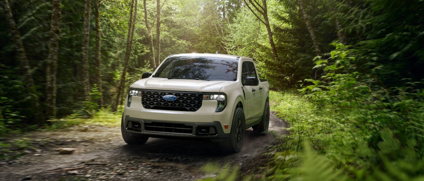 2026 Ford Maverick driving in forest