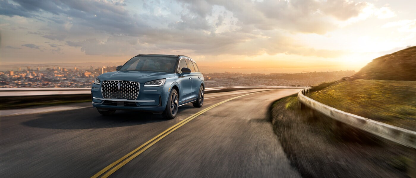 2025 Lincoln Corsair driving on curved highway