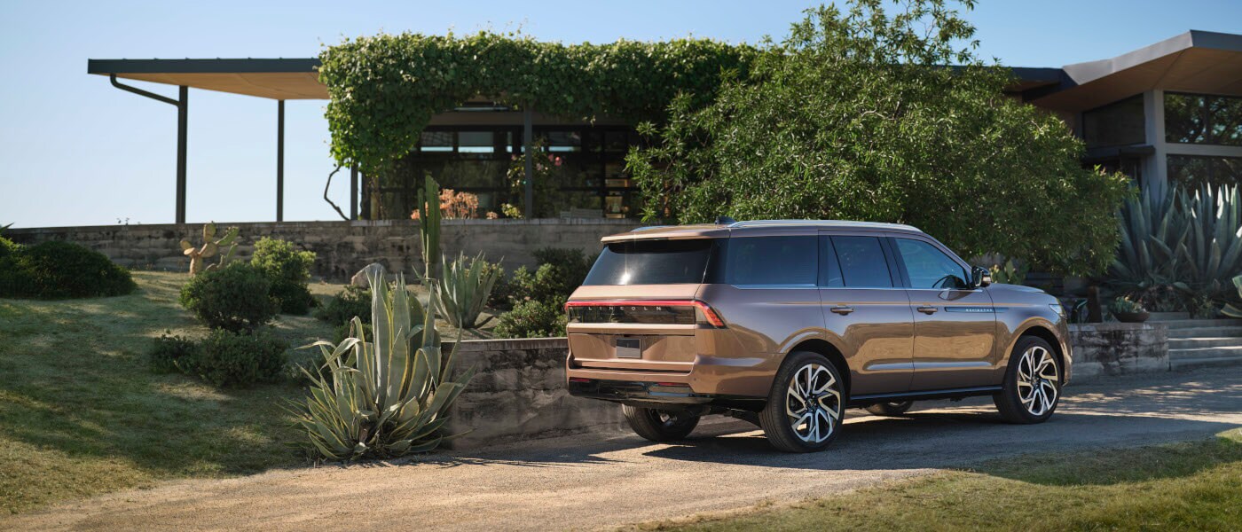 2027 Lincoln Navigator parked on a dirt driveway