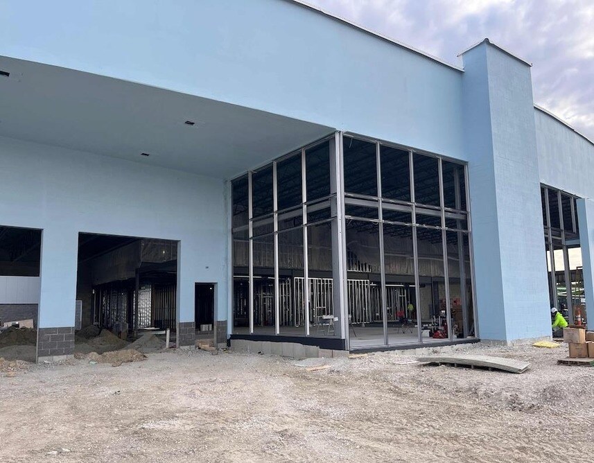 Exterior Waterproofing Installation Is In Progress At The New Building. Exterior Waterproofing Installation Is In Progress At The New Building.