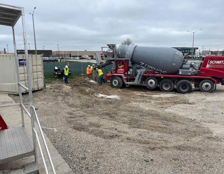 Concrete Pour In Progress At Site Lighting. Concrete Pour In Progress At Site Lighting.
