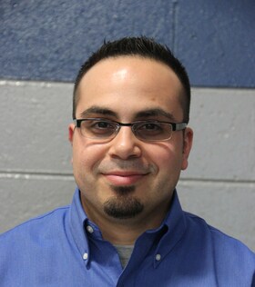 Staff member John Cvevas from ID_a5dbe0acd876