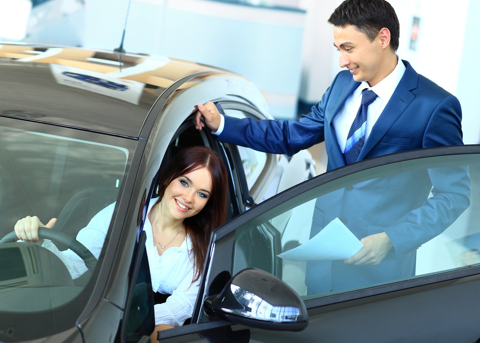 Woman buying a new car.jpg