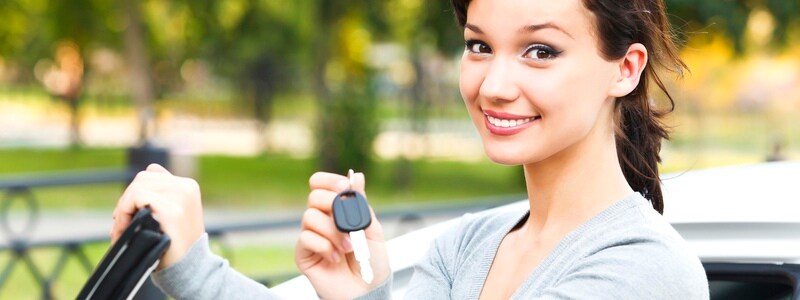 Woman holding car keys_6990419.jpg