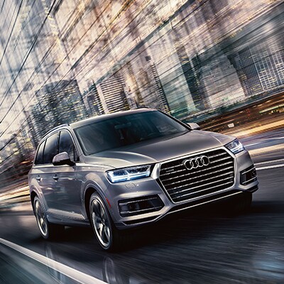 Audi Q7 driving down highway