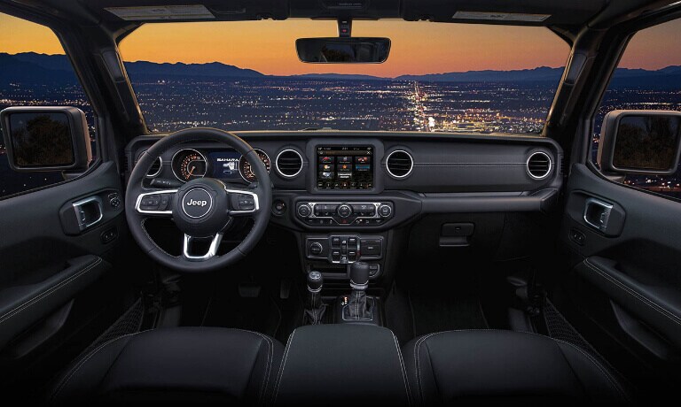 2019 Jeep Wrangler interior overlooking city at night
