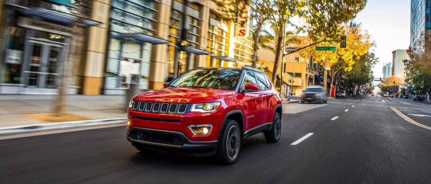 2021 Jeep Compass exterior driving downtown