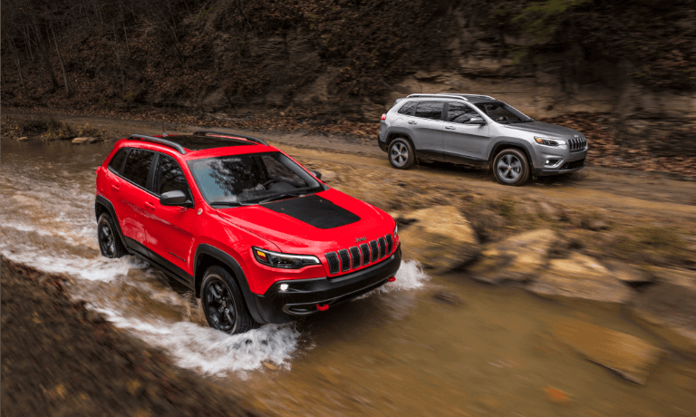 2022 Jeep Cherokee exterior driving through stream