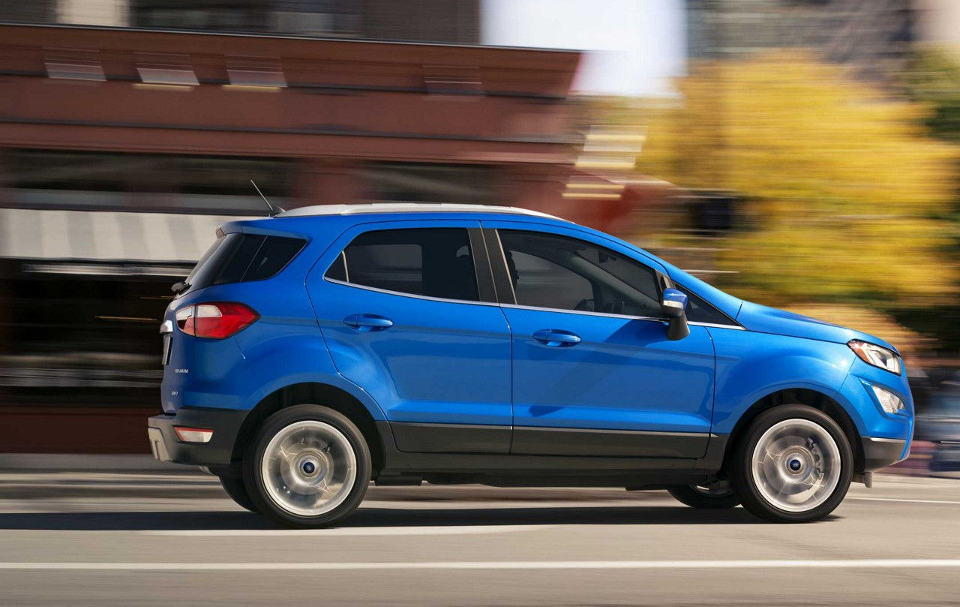 2018 Ford EcoSport A blue 2018 Ford EcoSport driving sideways to the viewer