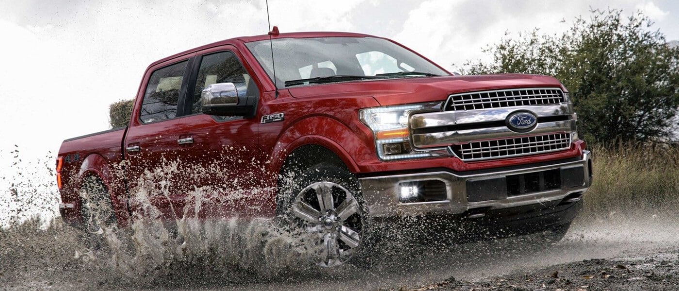 2019 Ford F-150 splashing through mud