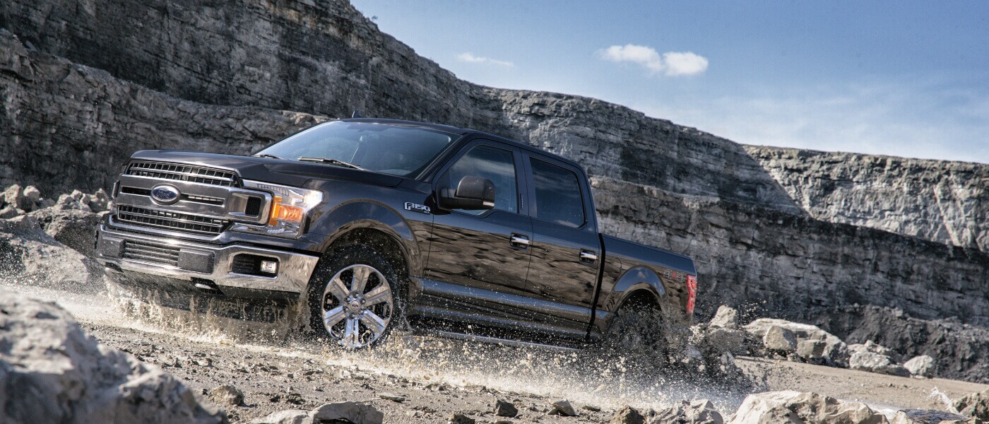 2019 Ford F-150 exterior driving on rocky canyon road