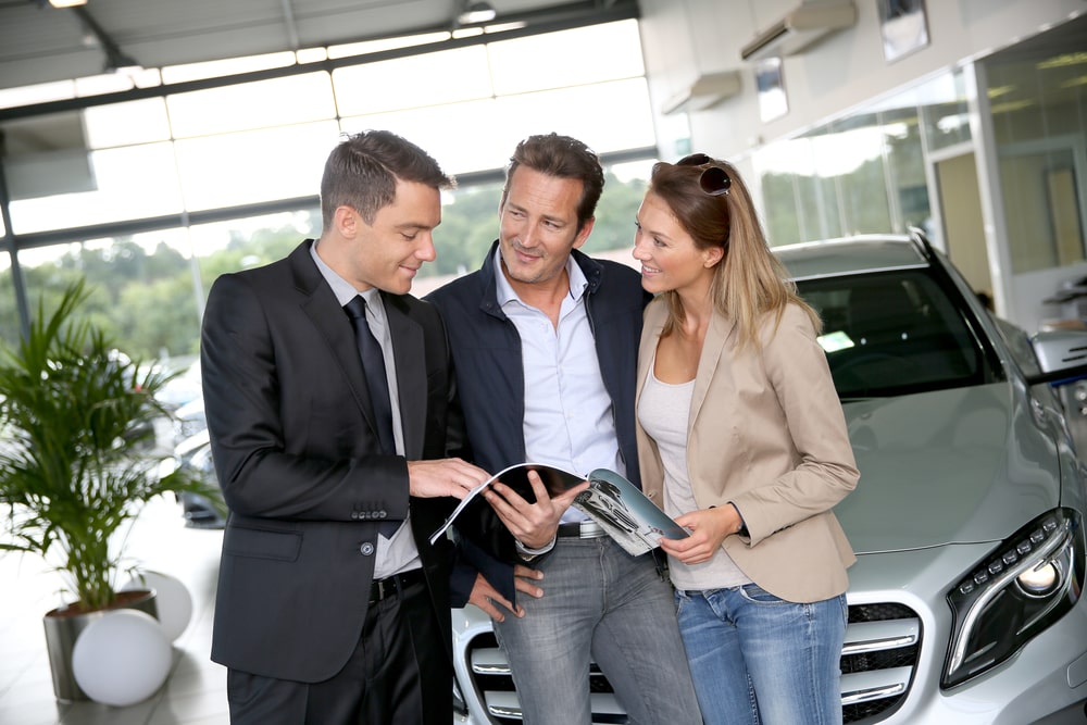 happy people in dealership
