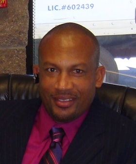 Staff member Garnett Thompson from ID_ff6d8c5782bf