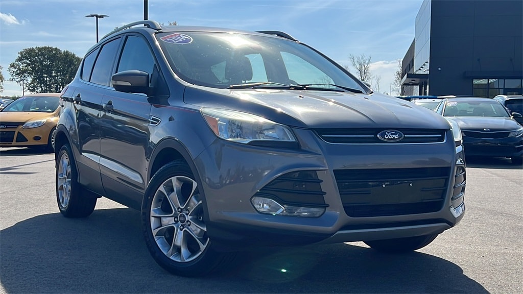 Used 2014 Ford Escape Titanium with VIN 1FMCU9JX1EUB53581 for sale in Flint, MI