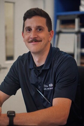 Staff member Stephen Pozik from ID_6c123caeb0d7