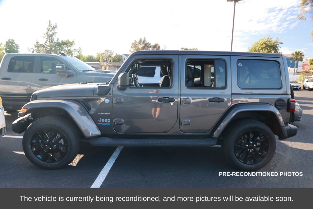 Used 2022 Jeep Wrangler Unlimited Sahara 4XE with VIN 1C4JJXP61NW103050 for sale in Norco, CA