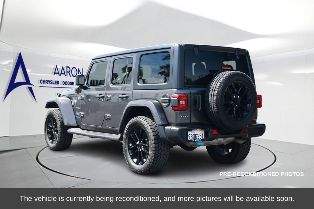 Used 2022 Jeep Wrangler Unlimited Sahara 4XE with VIN 1C4JJXP6XNW205771 for sale in Norco, CA