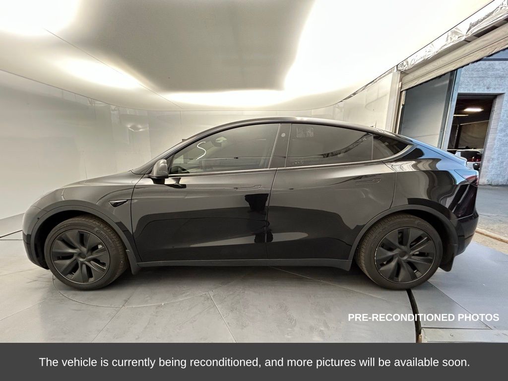 Used 2025 Tesla Model Y Long Range with VIN 7SAYGDED8SF251972 for sale in Kansas City