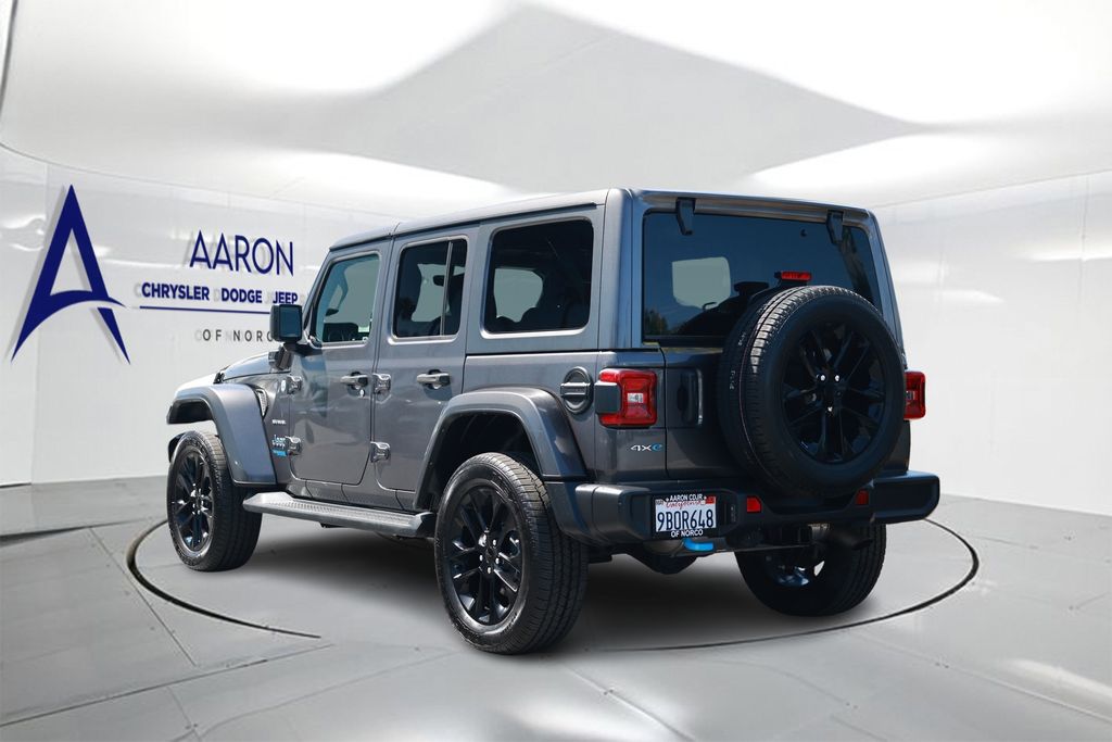 Used 2022 Jeep Wrangler Unlimited Sahara 4XE with VIN 1C4JJXP61NW103050 for sale in Norco, CA
