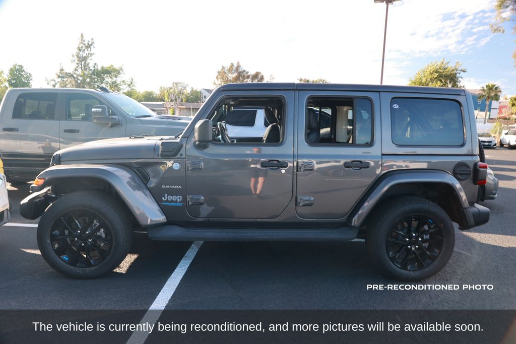 Used 2022 Jeep Wrangler Unlimited Sahara 4XE with VIN 1C4JJXP61NW103050 for sale in Norco, CA